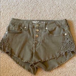 Lace embellished denim shorts